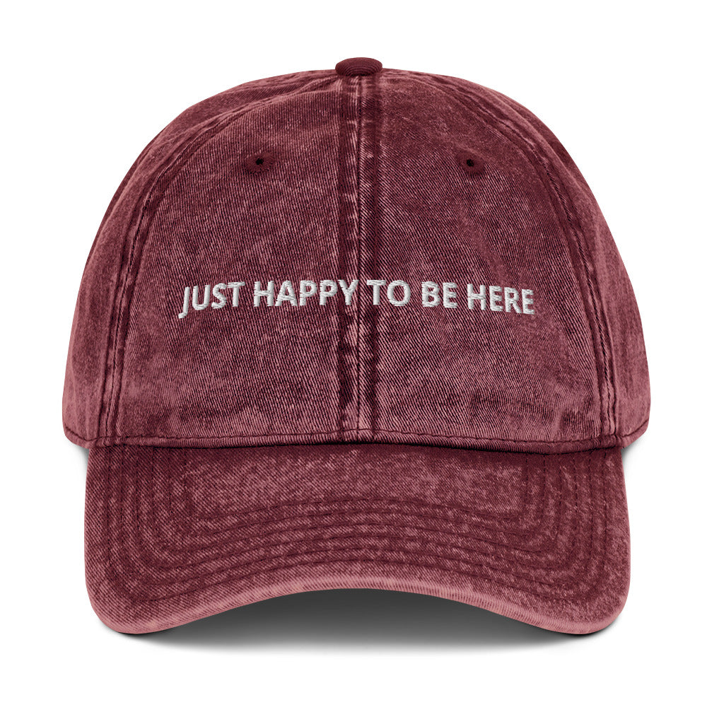 Maroon Our "Just Happy to Be Here" Dad Hat is comfy, adjustable, and perfect for everyday wear. Whether you’re traveling in Kazakhstan or snacking on the couch, this embroidered baseball cap adds a positive touch to any outfit.