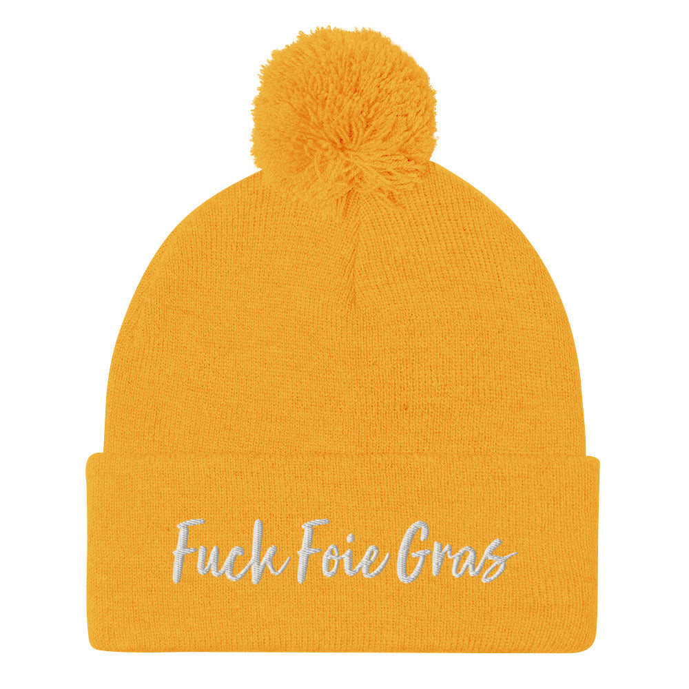 Yellow Fuck Foie Gras beanie from Nina's Funky Shop by ninanush - Wear this Fuck Foie Gras beanie and bring awareness for the cruel production practices. This activist hat is warm, cozy, and embroidered with the words "Fuck Foie Gras". What is Foie Gras? Foie gras, is a delicacy in French cuisine. It's the liver of a goose or duck that has been fattened through force-feeding.