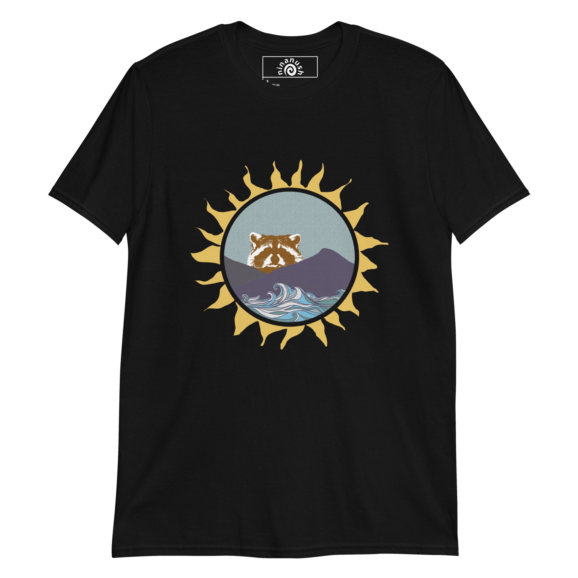 Black raccoon t-shirt from Nina's Funky Shop by ninanush - Do you love raccoons? Looking for a raccoon graphic tee? Our colorful Raccoon T-shirt design is just what you need. Expertly printed on a soft and comfortable cotton tee. It features a raccoon peering over mountains with blue waves and funky sun frame. Stand out and show off your love of raccoons and quirky tees.
