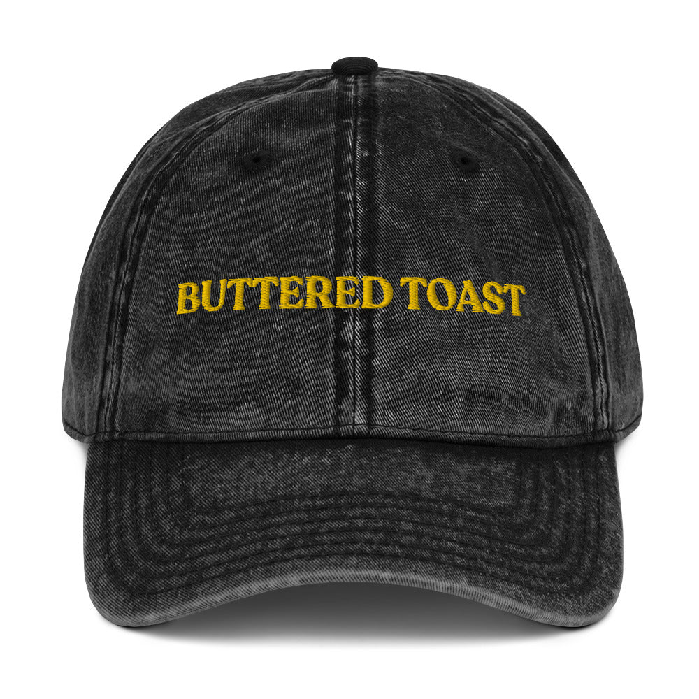 Black Buttered Toast Hat - Love buttered toast? Looking for a gift for a foodie? Our Buttered Toast Dad Hat is comfortable, adjustable and made just for you. It's a funny dad hat, expertly embroidered. Perfect for everyday streetwear or a gift for a buttered toast enthusiast!