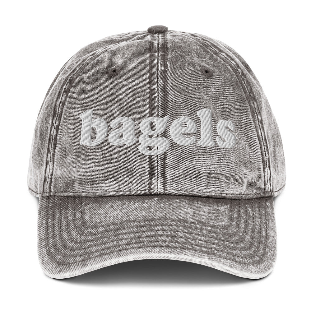Light Gray Bagels Hat - Make a statement in our Bagels Hat! It's comfortable, adjustable and made with a vintage style cotton that's expertly embroidered just for you. This funny dad hat is perfect for bagel enthusiasts and foodies of all kinds. Looking for something personalized? Shoot us a message!