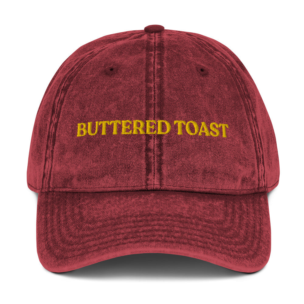 Maroon Buttered Toast Hat - Love buttered toast? Looking for a gift for a foodie? Our Buttered Toast Dad Hat is comfortable, adjustable and made just for you. It's a funny dad hat, expertly embroidered. Perfect for everyday streetwear or a gift for a buttered toast enthusiast!