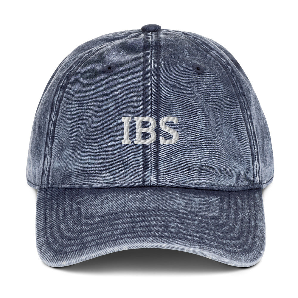 Blue  IBS dad hat from Nina's Funky Shop by ninanush - Share your gastrointestinal condition with the world in our IBS hat. Its a funny hat that has a stylish washed out material and "IBS" on the front. It's the perfect dad hat for foodies with IBS or a funny gift for a friend with IBS. Celebrate your favorite food and drinks in our funky foodie apparel, designed by Nina.