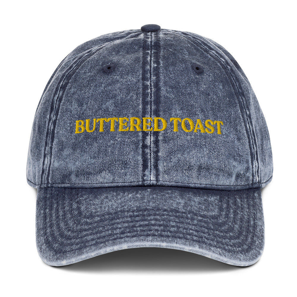 Blue Buttered Toast Hat - Love buttered toast? Looking for a gift for a foodie? Our Buttered Toast Dad Hat is comfortable, adjustable and made just for you. It's a funny dad hat, expertly embroidered. Perfect for everyday streetwear or a gift for a buttered toast enthusiast!