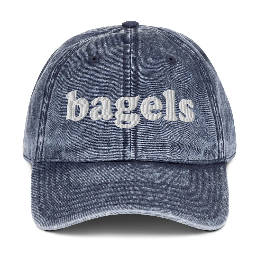 Blue Bagels hat - Make a statement in our Bagels Hat! It's comfortable, adjustable and made with a vintage style cotton that's expertly embroidered just for you. This funny dad hat is perfect for bagel enthusiasts and foodies of all kinds. Looking for something personalized? Shoot us a message!
