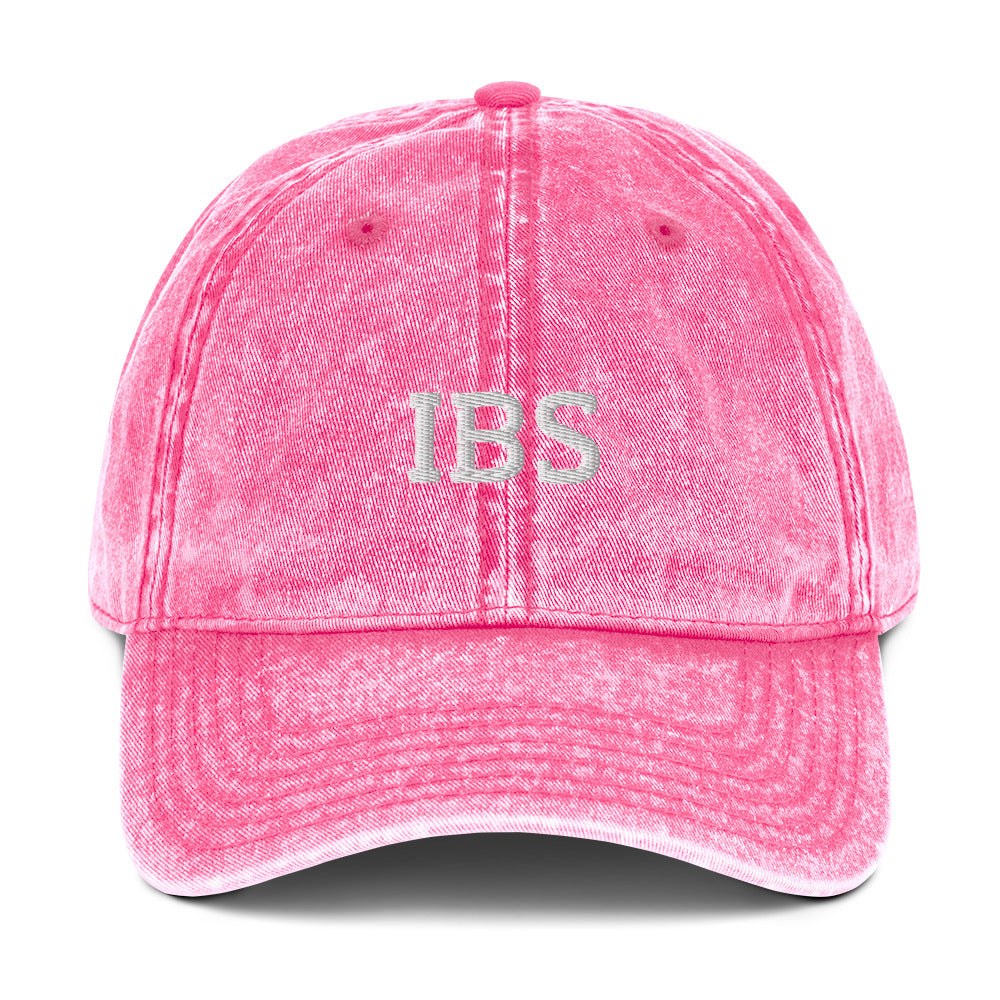Pink  IBS dad hat from Nina's Funky Shop by ninanush - Share your gastrointestinal condition with the world in our IBS hat. Its a funny hat that has a stylish washed out material and "IBS" on the front. It's the perfect dad hat for foodies with IBS or a funny gift for a friend with IBS. Celebrate your favorite food and drinks in our funky foodie apparel, designed by Nina.