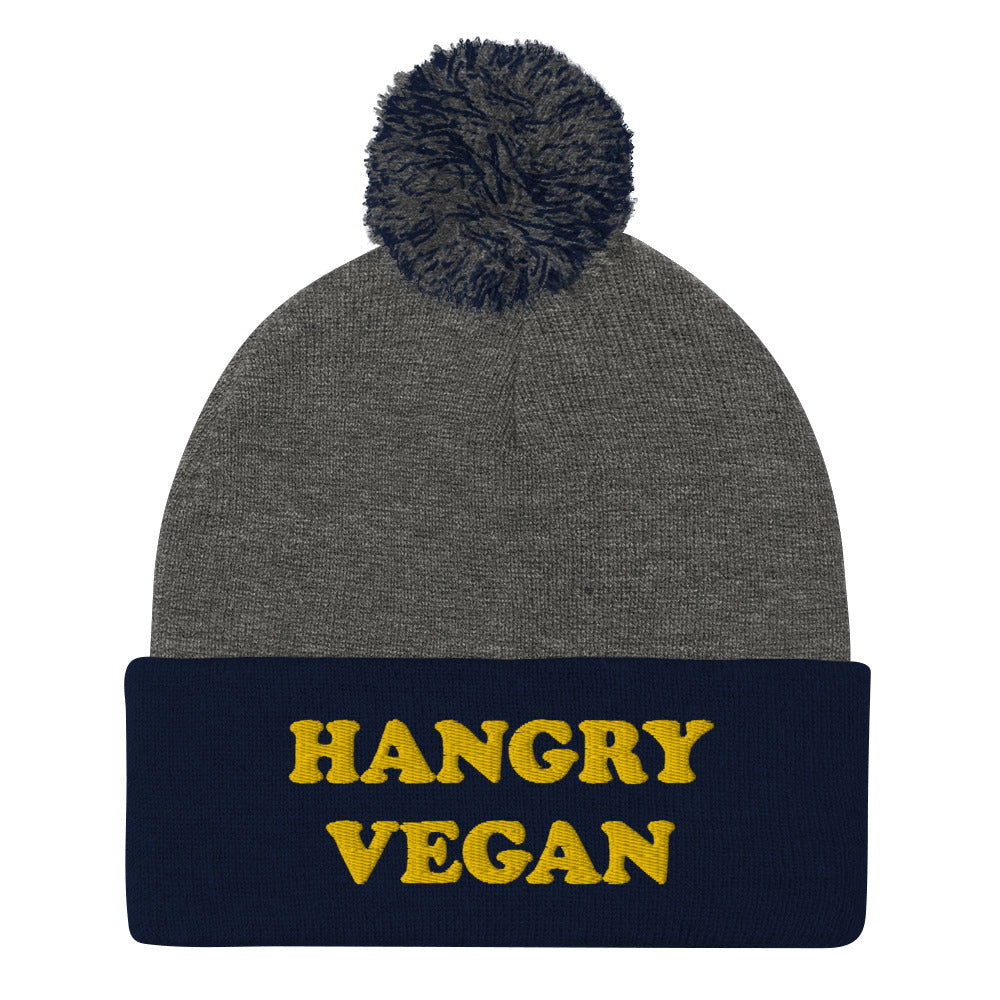 Are you a hangry vegan? This hangry vegan beanie is a unique vegan foodie beanie hat with a yellow embroidery. The hangry hat is a funny gift for vegans and plant based foodies. Shop funny animal lover beanies, foodie clothing, vegan graphic t-shirts, garlic hats and more.