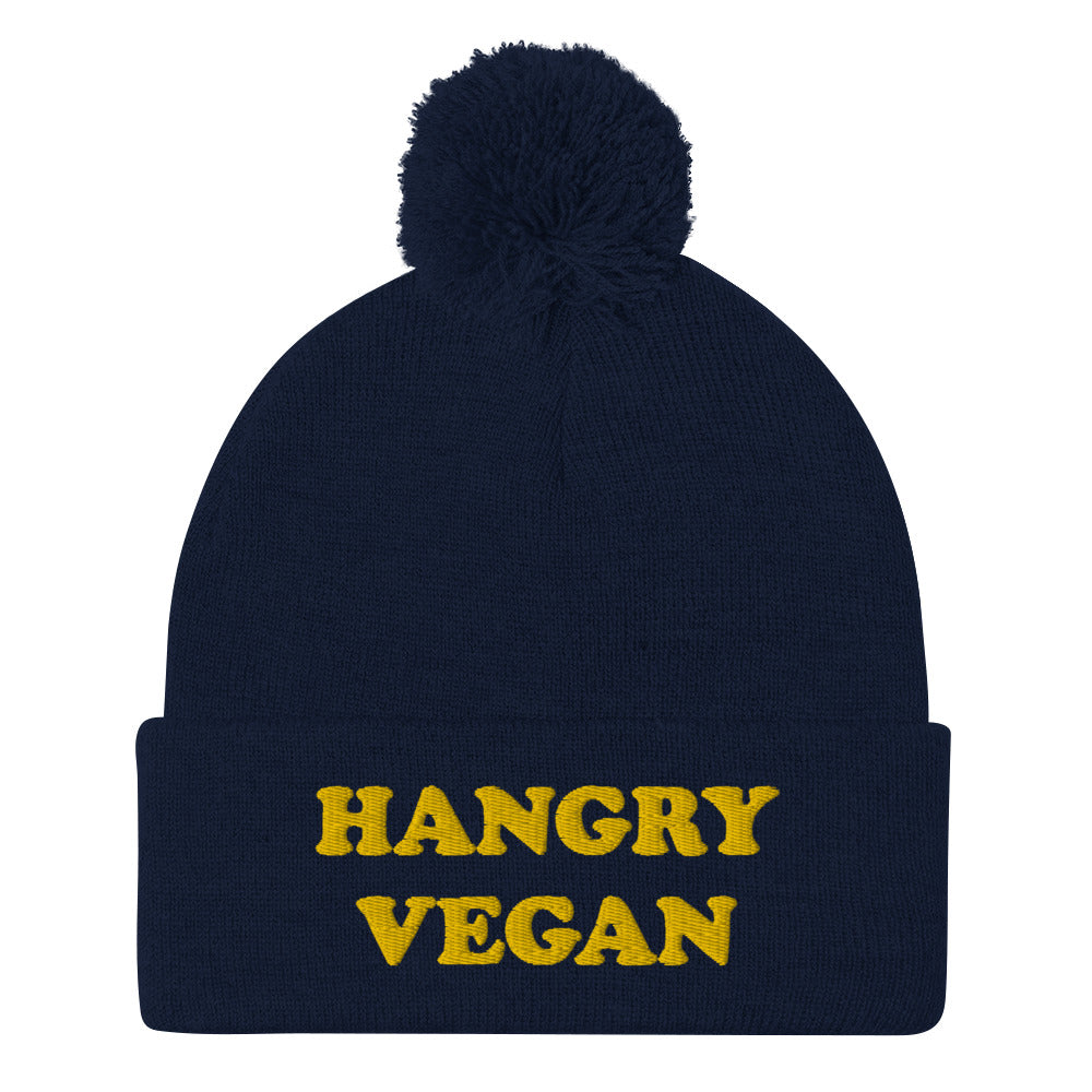 Are you a hangry vegan? This hangry vegan beanie is a unique vegan foodie beanie hat with a yellow embroidery. The hangry hat is a funny gift for vegans and plant based foodies. Shop funny animal lover beanies, foodie clothing, vegan graphic t-shirts, garlic hats and more.