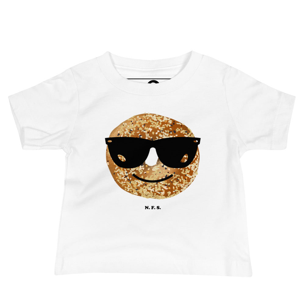 White Baby T-Shirt with Bagel Design - Our Cool Bagel T-Shirt is soft, comfortable, and a cute baby gift for a bagel lover. It has a hand drawn everything bagel design, expertly printed on the front. Designed by Nina and made just for you! 