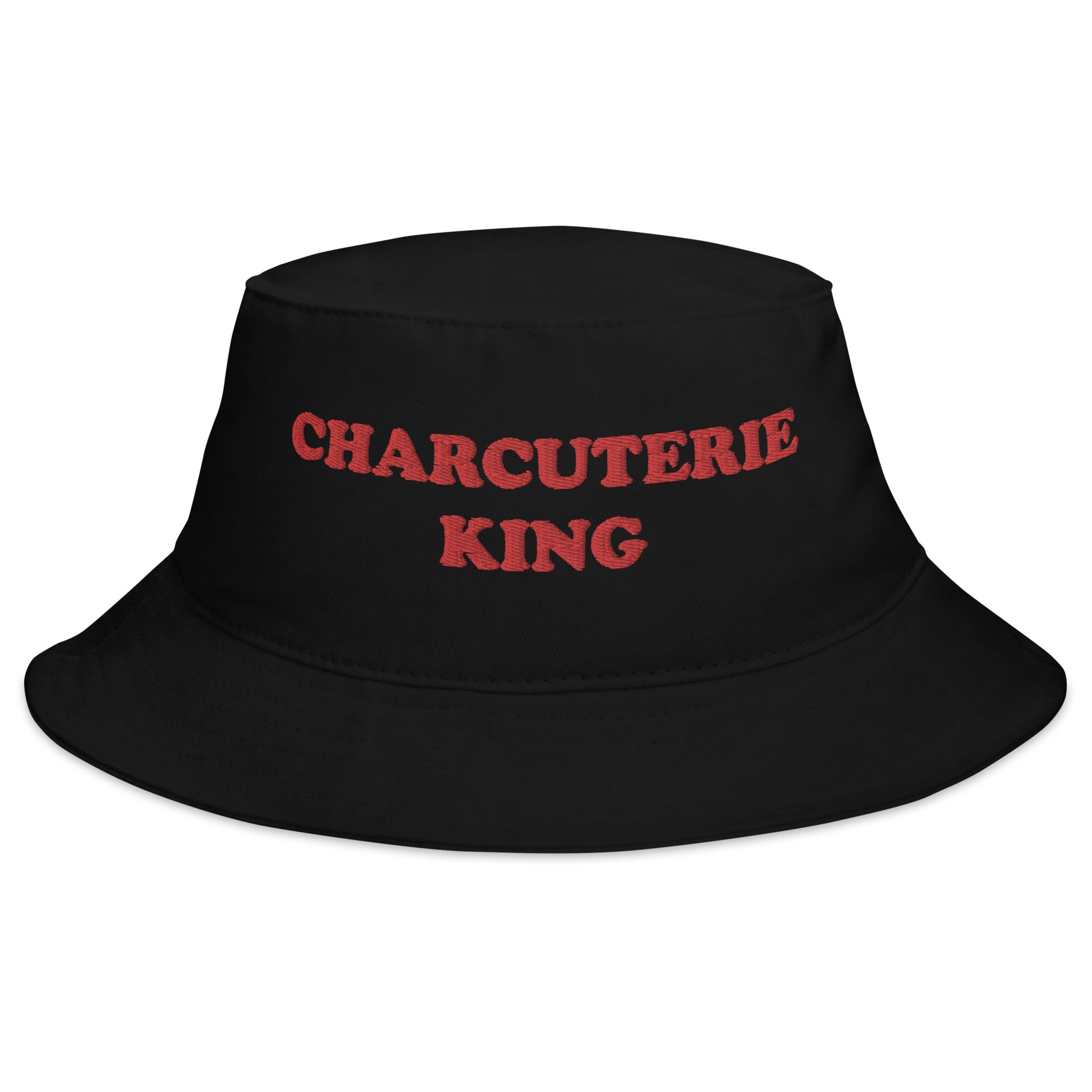 Black Charcuterie King Bucket Hat - Love charcuterie? Looking for a funny foodie hat? This Charcuterie King Bucket Hat is just what you need! It's comfortable and comes in a variety of colors with "Charcuterie King", expertly embroidered across the front. The perfect weird hat for charcuterie enthusiasts and foodies of all kinds. Celebrate your favorite foods in our funky foodie clothing and accessories.