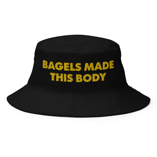 Black Bagel Hat - The perfect bagel bucket hat for bagel enthusiasts and foodies of all kinds! Eat your favorite bagels and turn heads in this funny bagel hat. It's a classic cotton bucket hat with a funny food saying, expertly embroidered on the front. Celebrate your favorite foods in our funky foodie clothing and accessories.