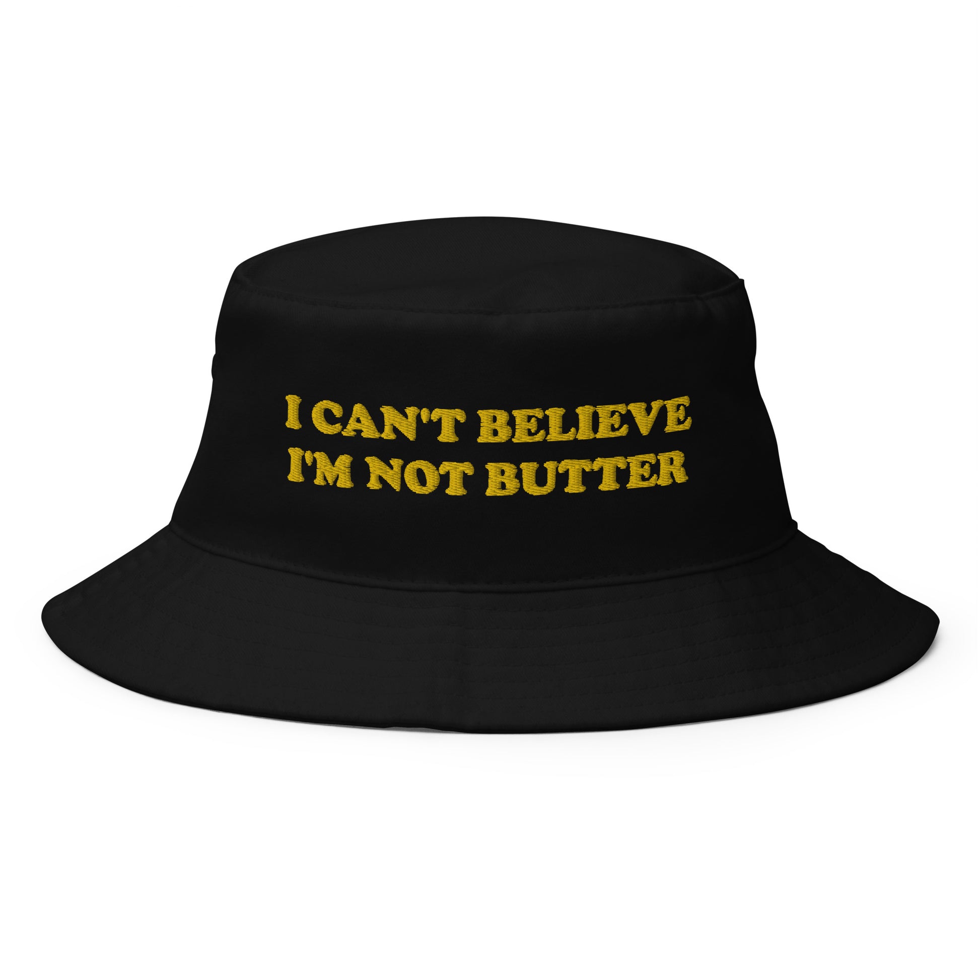 Black I Can't Believe I'm Not Butter Bucket Hat - Our I Can't Believe I'm Not Butter Bucket Hat is comfortable and perfect for any occasion. It's a classic cotton bucket hat with a funny saying, expertly embroidered on the front.