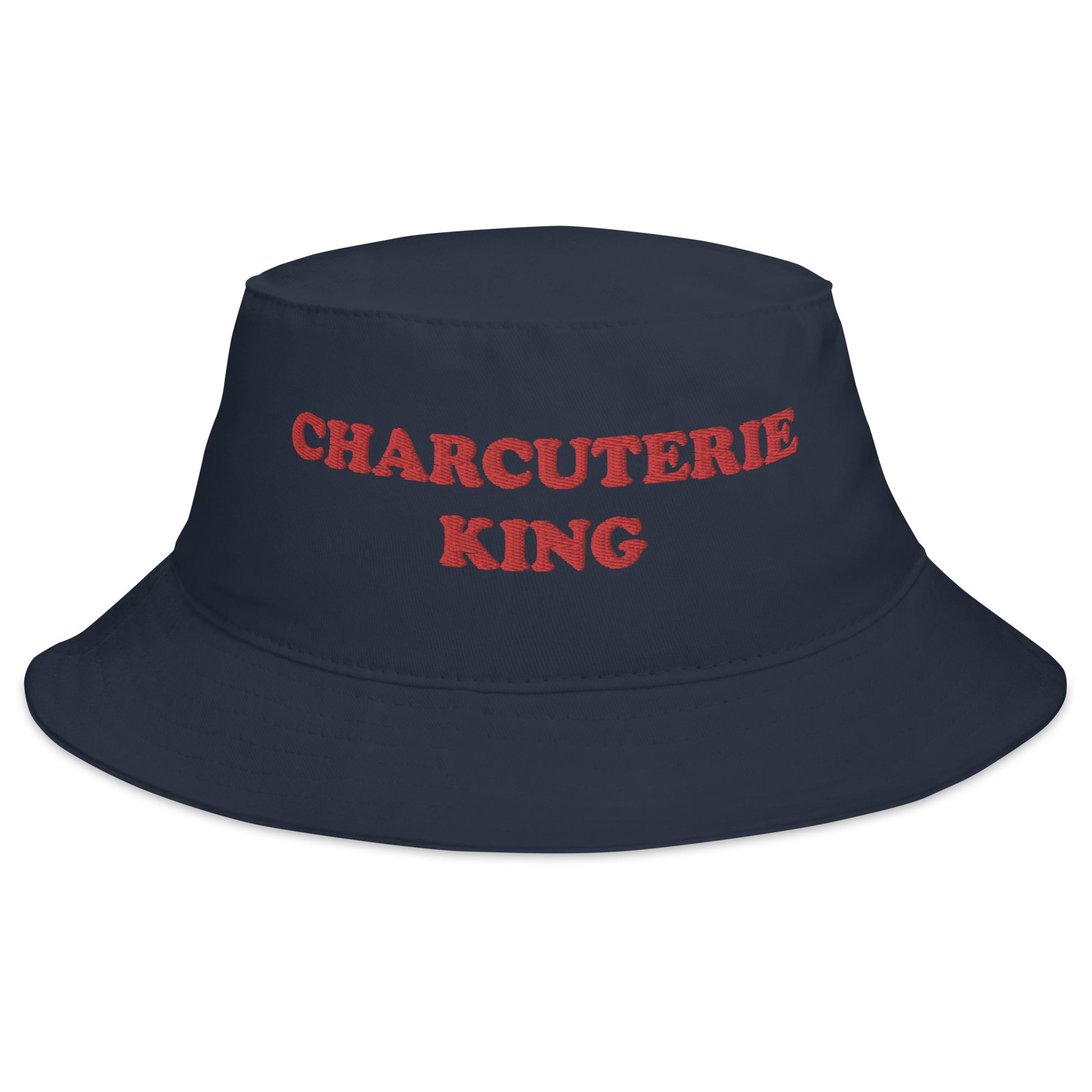 Navy Charcuterie King Bucket Hat - Love charcuterie? Looking for a funny foodie hat? This Charcuterie King Bucket Hat is just what you need! It's comfortable and comes in a variety of colors with "Charcuterie King", expertly embroidered across the front. The perfect weird hat for charcuterie enthusiasts and foodies of all kinds. Celebrate your favorite foods in our funky foodie clothing and accessories.