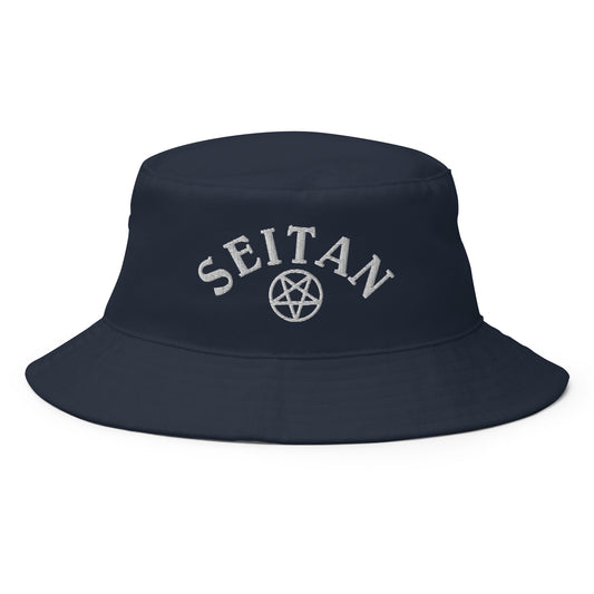 Navy Seitan Hat - Love Seitan? Looking for a funny hat for plant based babes? This Seitan Bucket Hat is just what you need! It's comfortable and comes in a variety of colors with "Seitan", expertly embroidered across the front. The perfect weird hat for foodies of all kinds. Celebrate your favorite foods in our funky foodie clothing and accessories. 