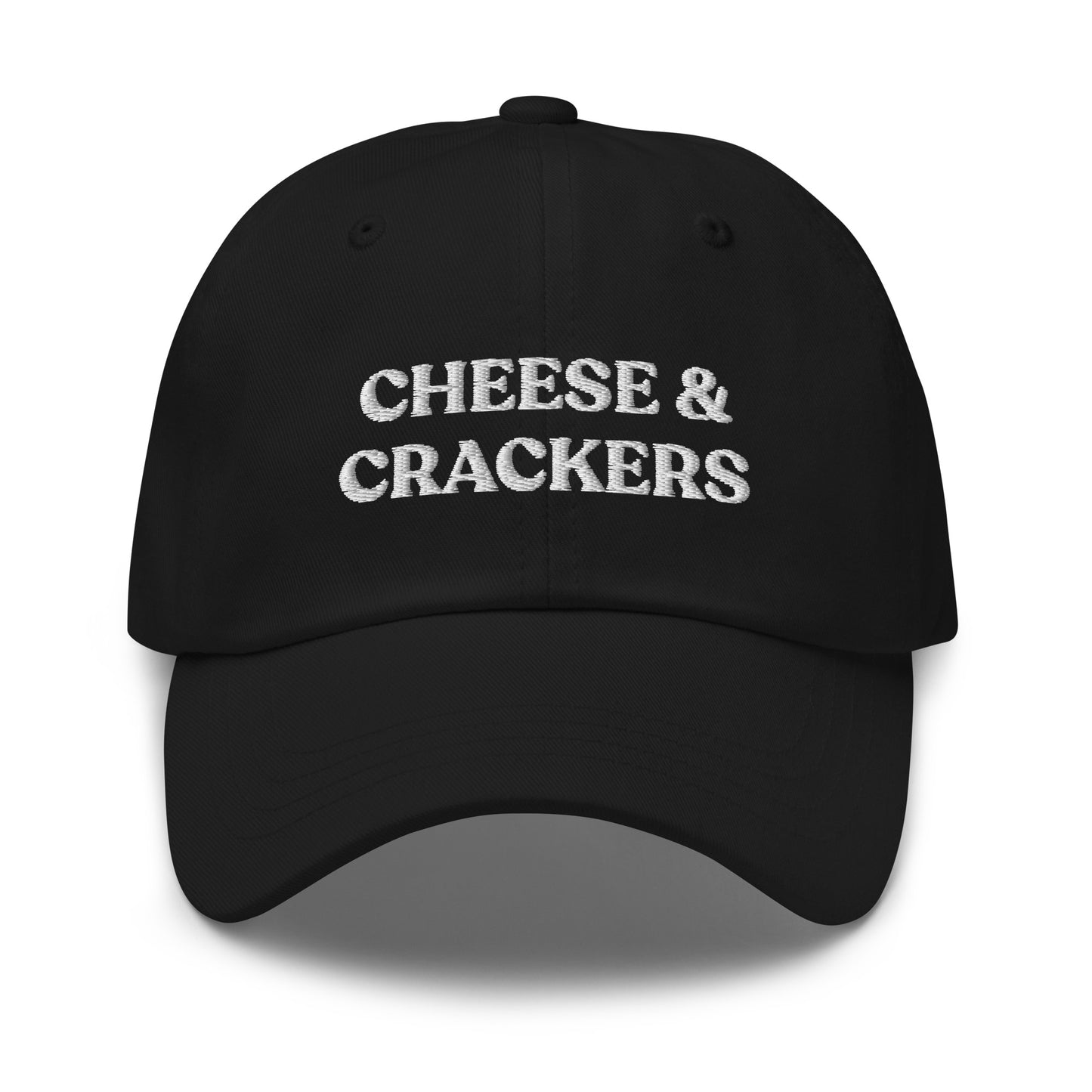 Black Cheese and Crackers Hat - If you love cheese and crackers, this funny foodie dad hat might be just what you need! Our Cheese & Crackers Hat is comfortable, adjustable and comes in a variety of colors. It's a classic dad hat embroidered with your favorite foods. Perfect for everyday streetwear or a gift for a charcuterie king or queen.