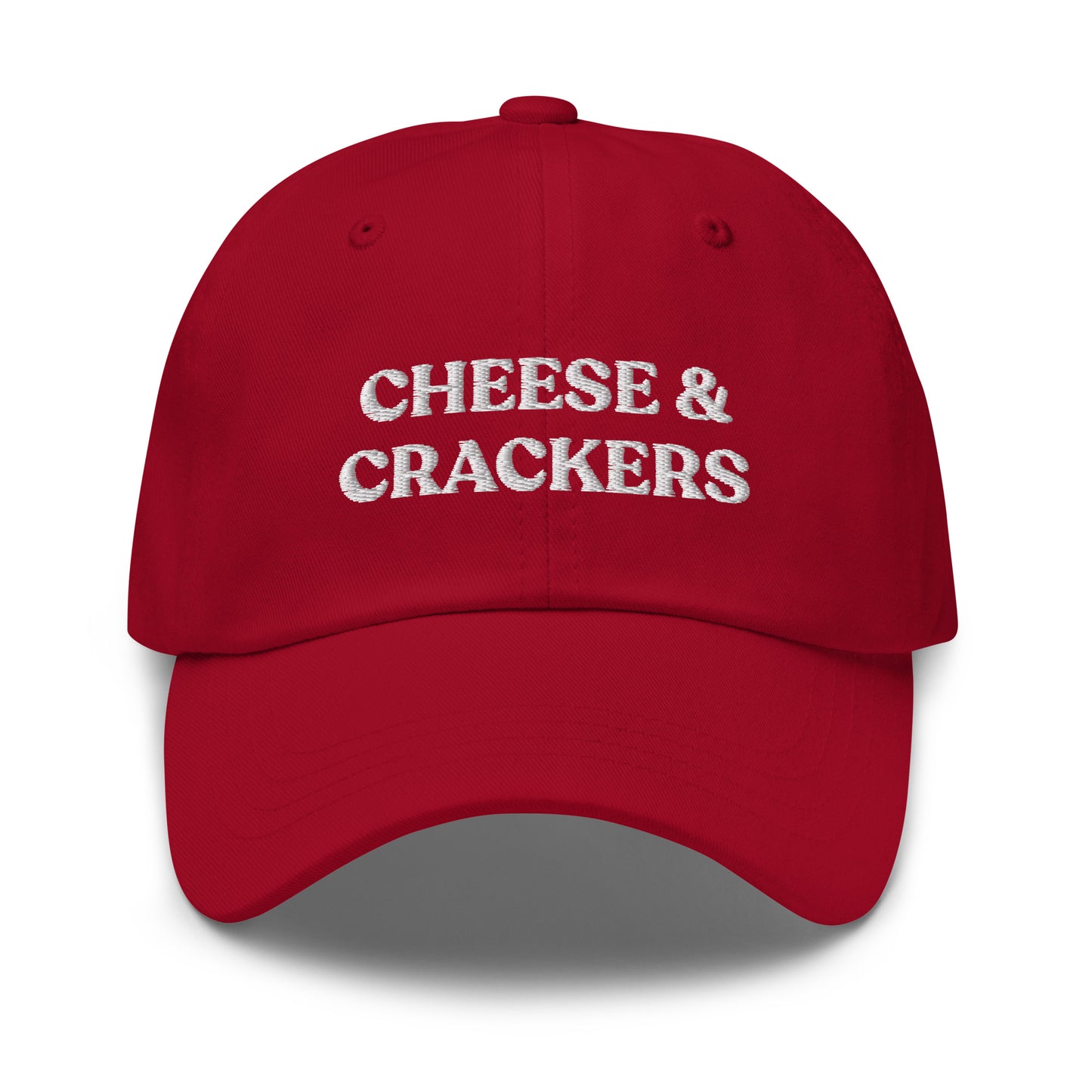 Red Cheese and Crackers Hat - If you love cheese and crackers, this funny foodie dad hat might be just what you need! Our Cheese & Crackers Hat is comfortable, adjustable and comes in a variety of colors. It's a classic dad hat embroidered with your favorite foods. Perfect for everyday streetwear or a gift for a charcuterie king or queen.