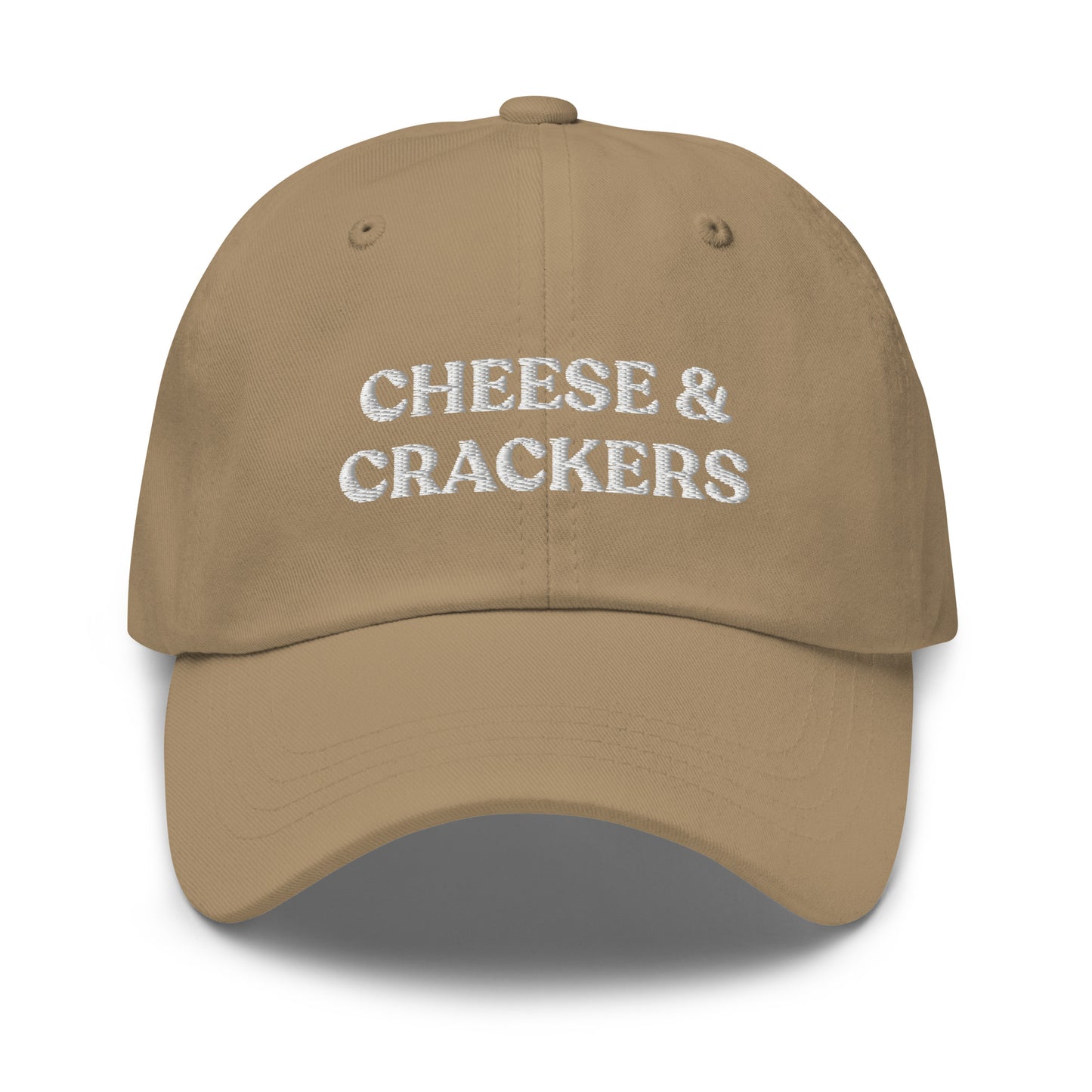 Khaki Cheese and Crackers Hat - If you love cheese and crackers, this funny foodie dad hat might be just what you need! Our Cheese & Crackers Hat is comfortable, adjustable and comes in a variety of colors. It's a classic dad hat embroidered with your favorite foods. Perfect for everyday streetwear or a gift for a charcuterie king or queen. 