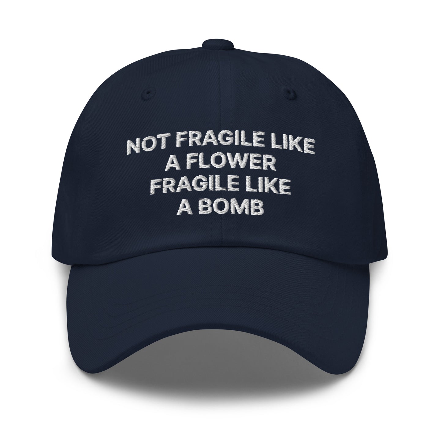 Navy Not Fragile Like A Flower, Fragile Like A Bomb Hat - This dad hat is not just for dads! Our Fragile Like A Bomb Dad Hat is comfortable, comes in a variety of colors and is the perfect accessory for everyday streetwear. It's a classic cotton dad hat with an adjustable strap and a funny saying, expertly embroidered on the front.