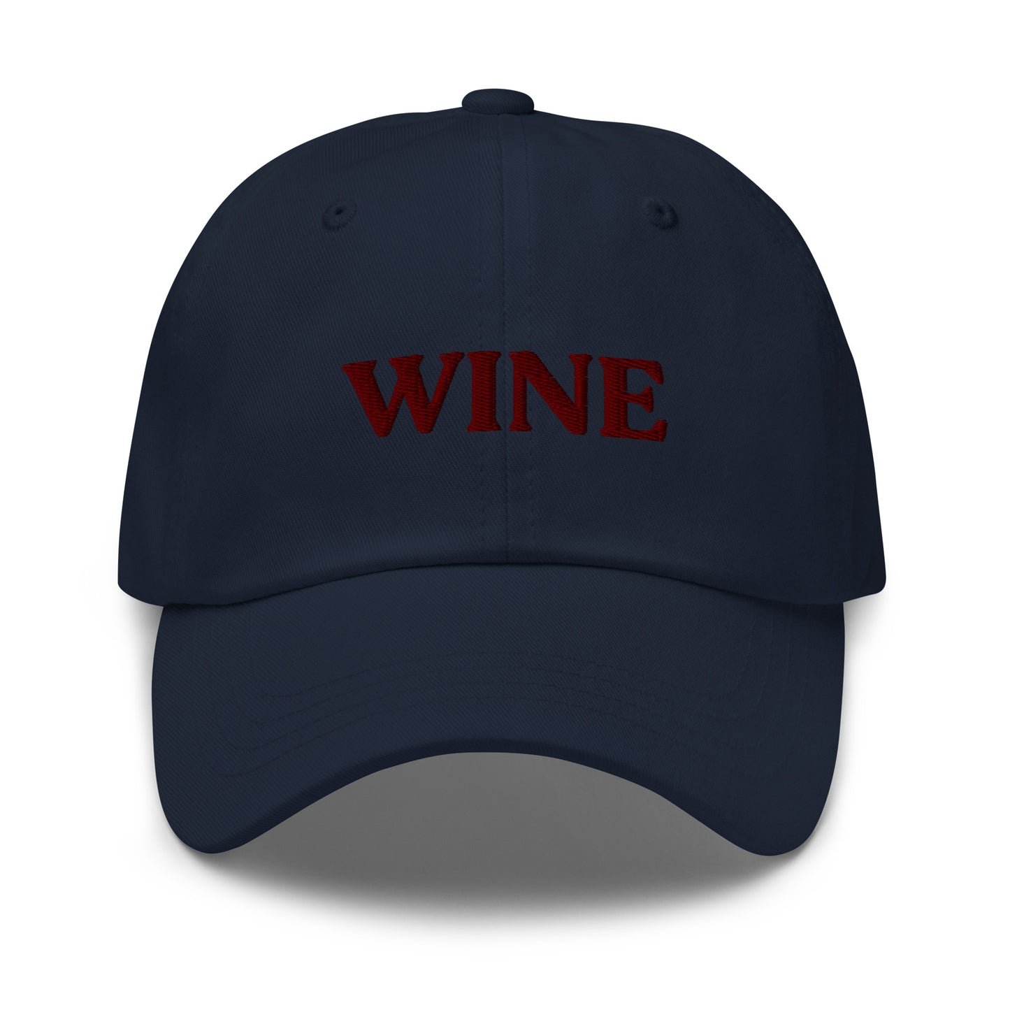 Navy Wine Hat - This embroidered wine hat is made of comfortable cotton with an adjustable closure and "wine", expertly embroidered on the front. Make a statement and drink your favorite wine in our funny foodie clothing and accessories. Looking for something personalized? Shoot us an email!