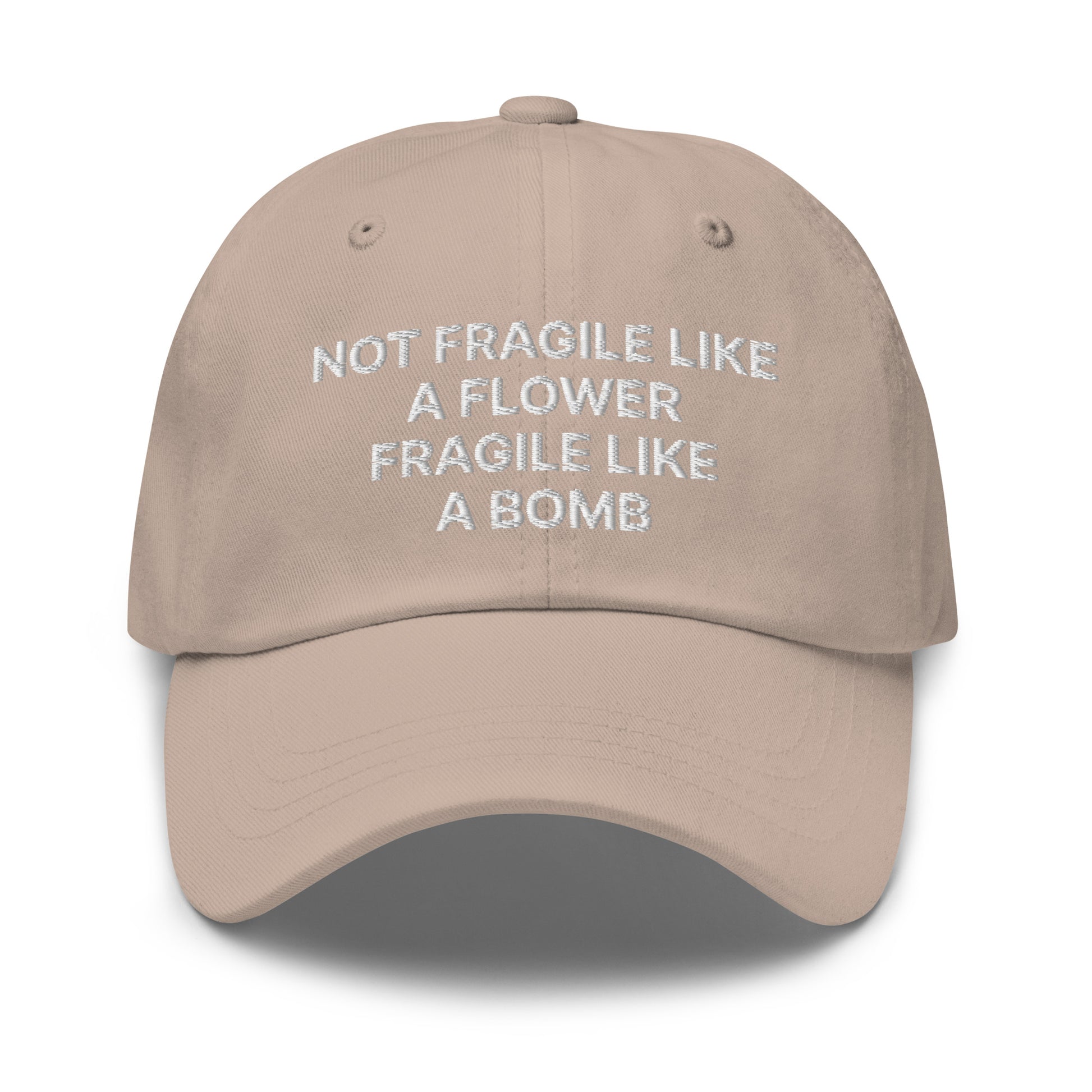 Beige Not Fragile Like A Flower, Fragile Like A Bomb Hat - This dad hat is not just for dads! Our Fragile Like A Bomb Dad Hat is comfortable, comes in a variety of colors and is the perfect accessory for everyday streetwear. It's a classic cotton dad hat with an adjustable strap and a funny saying, expertly embroidered on the front.