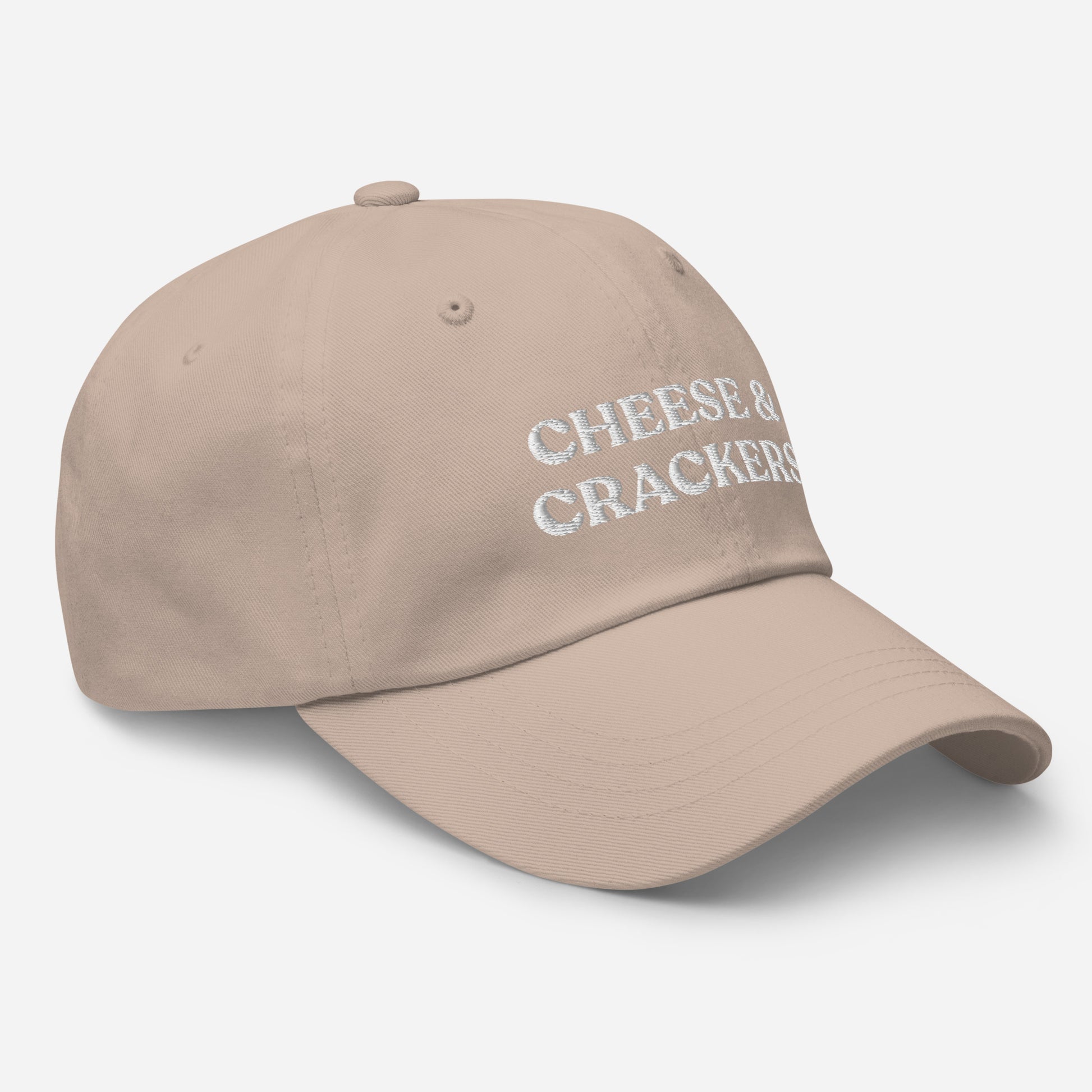 Stone Cheese and Crackers Hat - If you love cheese and crackers, this funny foodie dad hat might be just what you need! Our Cheese & Crackers Hat is comfortable, adjustable and comes in a variety of colors. It's a classic dad hat embroidered with your favorite foods. Perfect for everyday streetwear or a gift for a charcuterie king or queen.