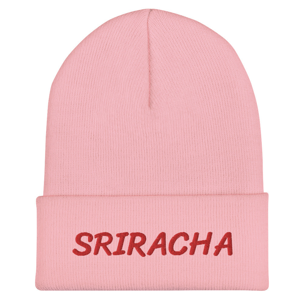 Pink sriracha beanie from Nina's Funky Shop by ninanush - Our Sriracha Beanie is warm, cozy and the perfect hat for hot sauce enthusiasts of all kinds. Show off in this funny foodie beanie. It comes in a variety of bold colors, each expertly embroidered with the word "Sriracha". It's a stylish statement hat for sriracha lovers, designed by Nina and made just for you!