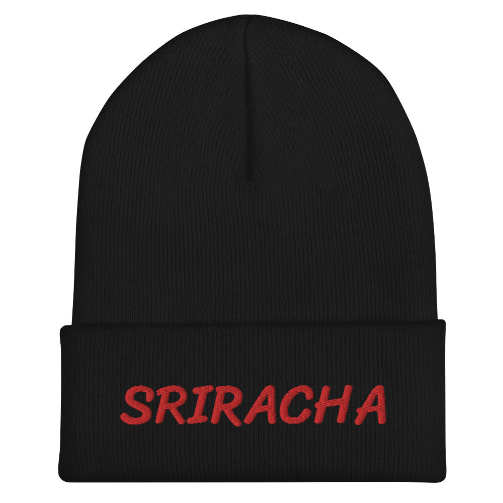 Black sriracha beanie from Nina's Funky Shop by ninanush - Our Sriracha Beanie is warm, cozy and the perfect hat for hot sauce enthusiasts of all kinds. Show off in this funny foodie beanie. It comes in a variety of bold colors, each expertly embroidered with the word "Sriracha". It's a stylish statement hat for sriracha lovers, designed by Nina and made just for you!