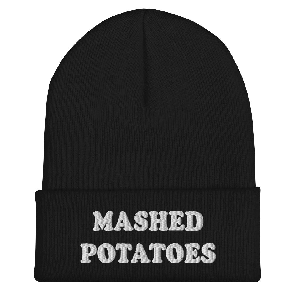 Black  Mashed Potato Beanie from Nina's Funky Shop by ninanush - Do you love mashed potatoes? Are you looking for a funny gift for a foodie friend? Our Mashed Potatoes Beanie is warm, cozy and the perfect funky hat for potato enthusiasts of all kinds. Show off in this funny foodie beanie. It comes in a variety of colors, each expertly embroidered with the words "Mashed Potatoes".