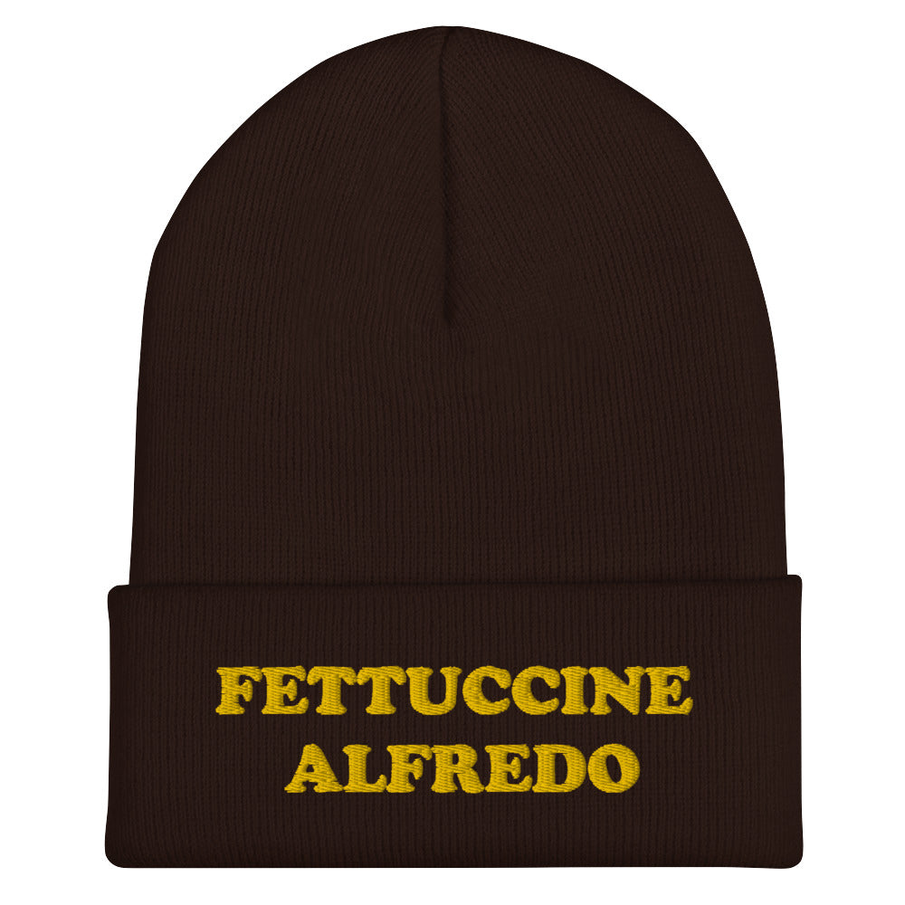 Brown Hat with Fettuccine Alfredo Embroidered in Yellow - Do you love Fettuccine Alfredo? Are you looking for a funny gift for a foodie friend? Our Fettuccine Alfredo Beanie is the perfect funky hat for fettuccine enthusiasts. Celebrate patsa in this funny beanie for foodies. It comes in a variety of colors, each hat with Fettuccine Alfredo embroidered in yellow.