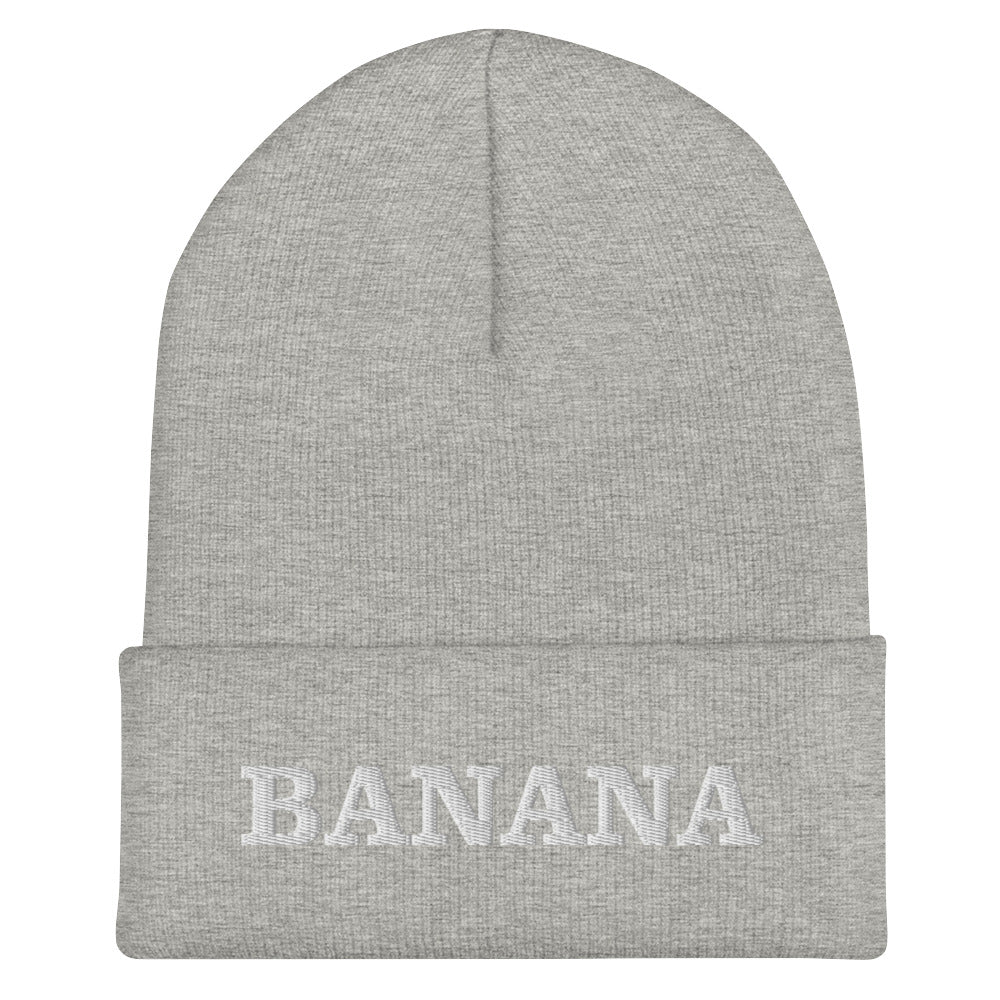 Light Gray Banana Beanie from Nina's Funky Shop by ninanush - Our Banana Beanie is warm, cozy and made just for you! It comes in a variety of colors, each expertly embroidered with "Banana" across the front. A statement hat for banana enthusiasts and foodies of all kinds. Celebrate your favorite foods in our funky foodie apparel.