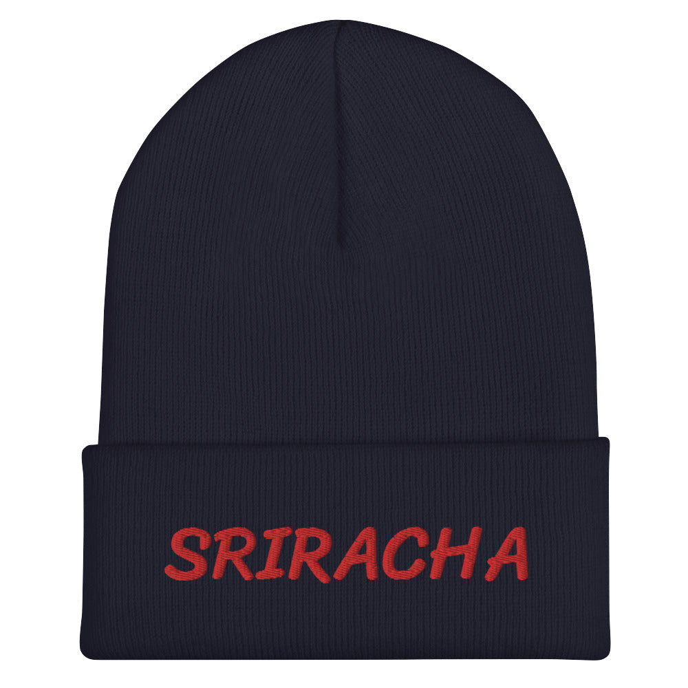 Navy sriracha beanie from Nina's Funky Shop by ninanush - Our Sriracha Beanie is warm, cozy and the perfect hat for hot sauce enthusiasts of all kinds. Show off in this funny foodie beanie. It comes in a variety of bold colors, each expertly embroidered with the word "Sriracha". It's a stylish statement hat for sriracha lovers, designed by Nina and made just for you!