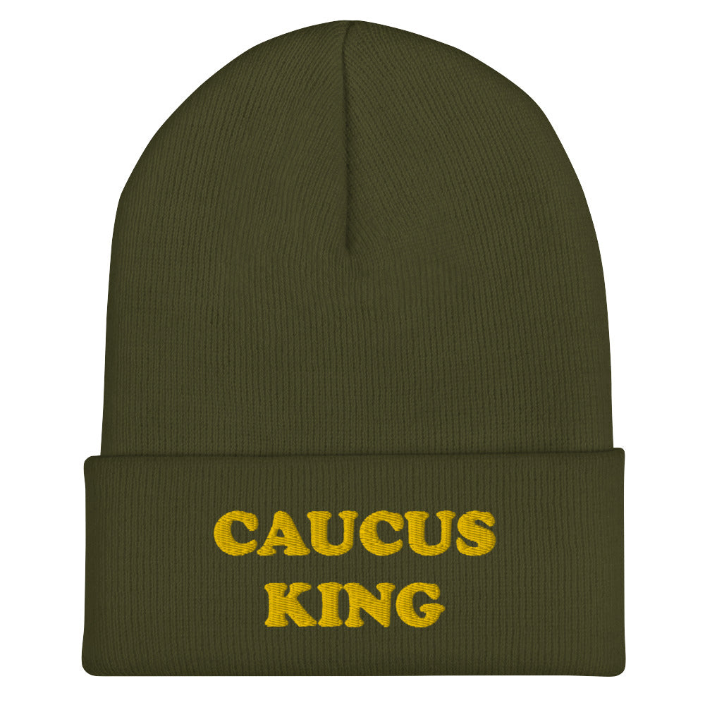 Olive Green Caucus Beanie - A colorful beanie with "Caucus King", expertly embroidered across the front. The perfect funny hat for a caucus. Check out our caucus queen beanie, too! Looking for something more personalized? Shoot us an email! shop@ninanush.com We can change the text and/or the embroidery color to create a design you'll love!