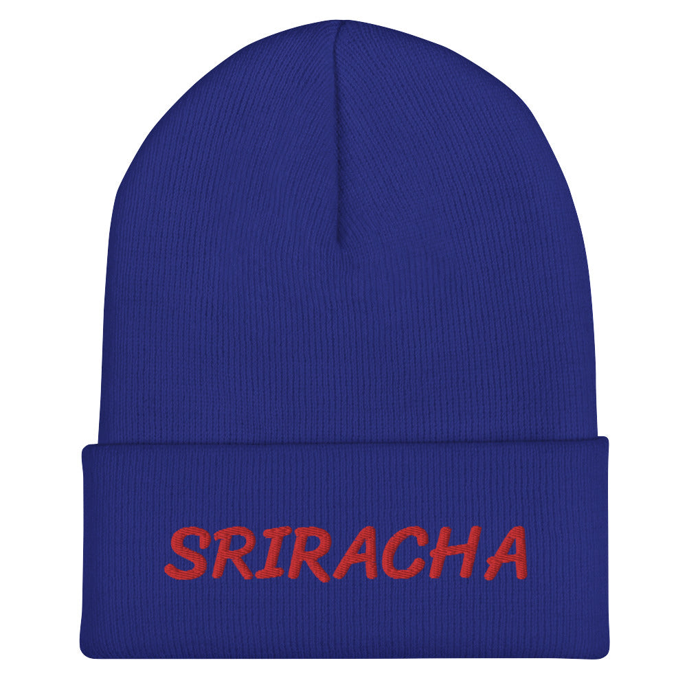 Royal blue sriracha beanie from Nina's Funky Shop by ninanush - Our Sriracha Beanie is warm, cozy and the perfect hat for hot sauce enthusiasts of all kinds. Show off in this funny foodie beanie. It comes in a variety of bold colors, each expertly embroidered with the word "Sriracha". It's a stylish statement hat for sriracha lovers, designed by Nina and made just for you!