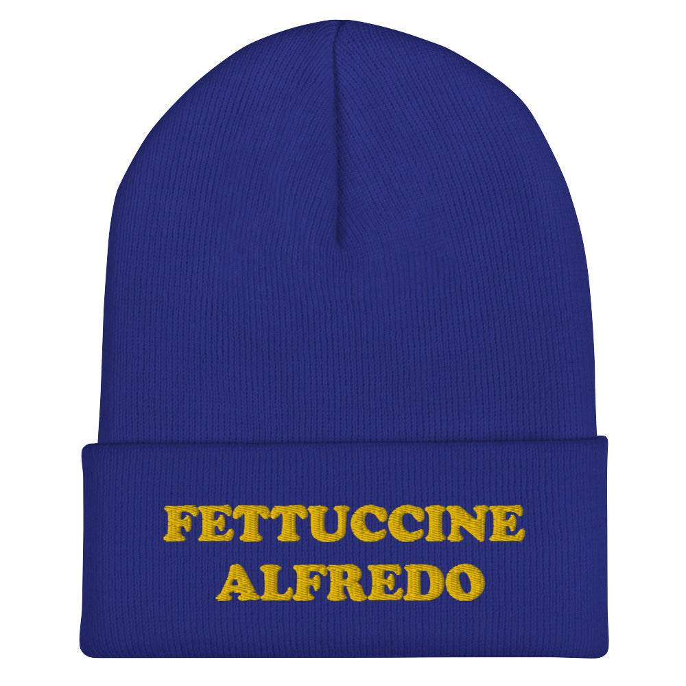 Royal Blue Hat with Fettuccine Alfredo Embroidered in Yellow - Do you love Fettuccine Alfredo? Are you looking for a funny gift for a foodie friend? Our Fettuccine Alfredo Beanie is the perfect funky hat for fettuccine enthusiasts. Celebrate patsa in this funny beanie for foodies. It comes in a variety of colors, each hat with Fettuccine Alfredo embroidered in yellow.