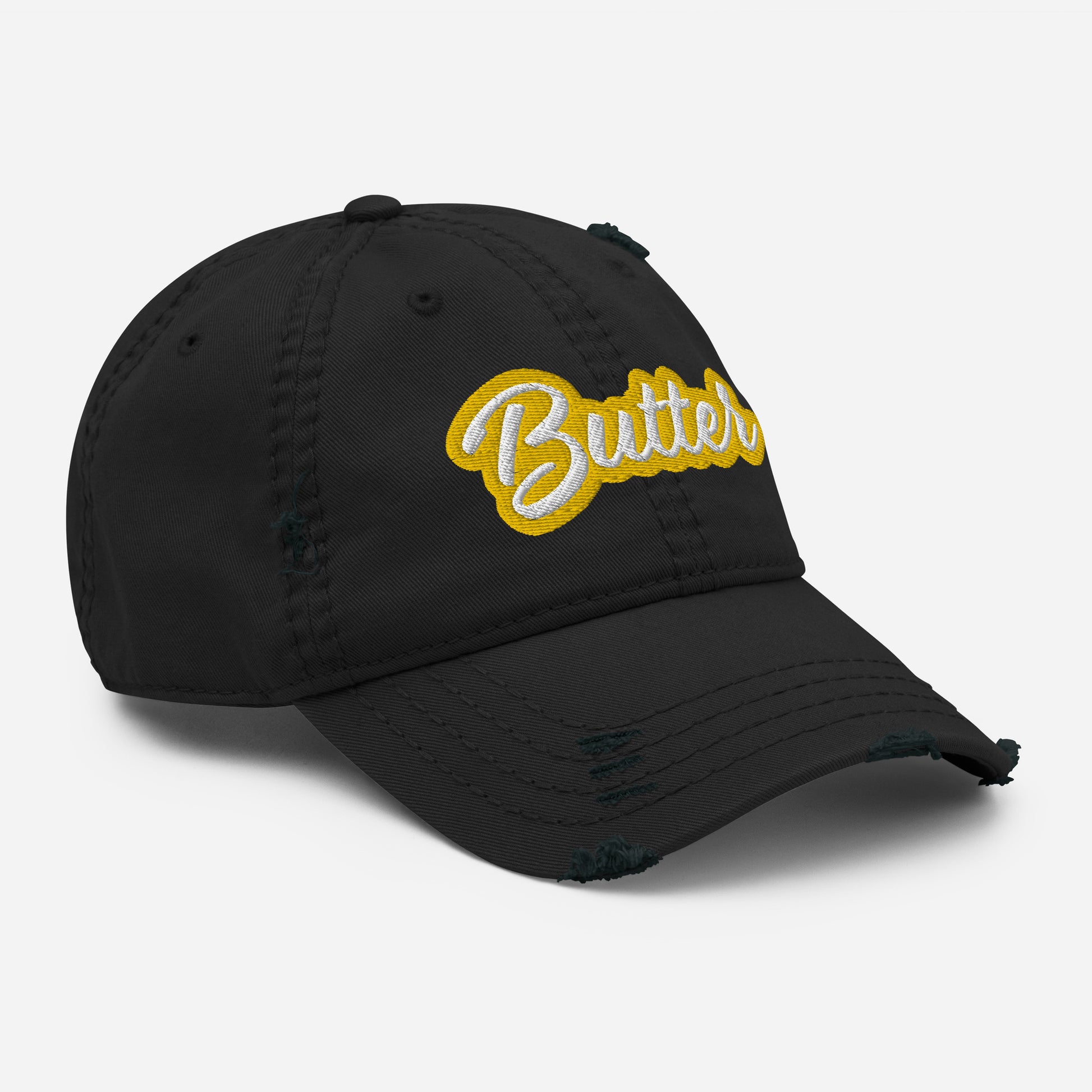 Black Butter Hat - Love butter? Looking for a gift for your favorite butter enthusiast? This Butter Hat is made of comfortable cotton with an adjustable closure and "Butter", expertly embroidered on the front. A funny foodie hat, designed by Nina and made just for you!