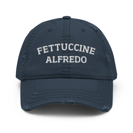 Navy fettuccine Alfredo dad hat from Nina's Funky Shop by ninanush - A distressed fettuccine Alfredo dad hat, expertly embroidered with "Fettuccine Alfredo." It's a funny pasta lover hat, made just for you. This fettuccine Alfredo hat stands out and makes the perfect gift for fettuccine Alfredo enthusiasts. Celebrate your favorite foods in our funny foodie clothing and accessories. 