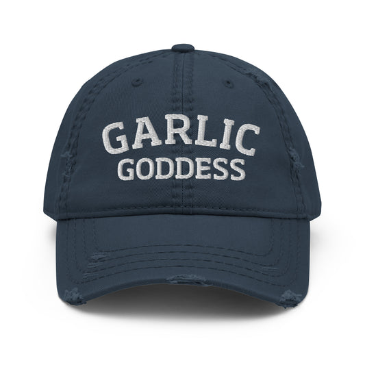 Navy garlic goddess hat from Nina's Funky Shop by ninanush - This garlic goddess dad hat is comfortable, with a unique text embroidery and a stylish distressed fabric. Stand out in a garlic goddess hat and add some personality to your style in this funny dad hat for garlic enthusiasts. It's a weird hat that celebrates garlic and the perfect dad hat for foodies and garlic lovers.