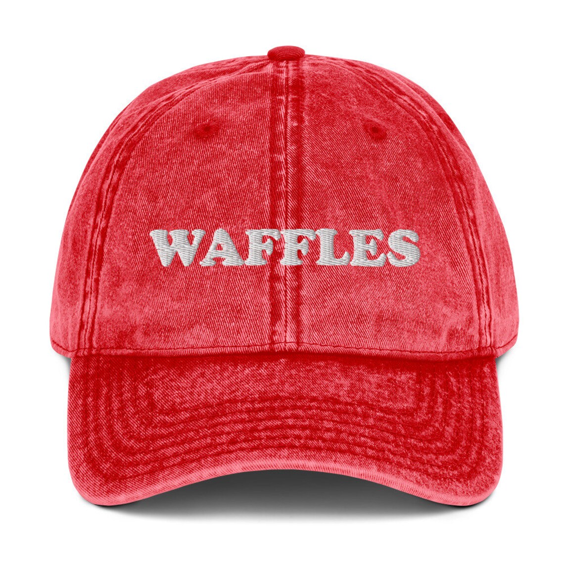 Vintage style red foodie dad hat - The Waffles Dad Hat! This funny food dad hat is the perfect everyday accessory to show off your love of waffles. Wear the unique foodie dad hat for any occasion or give it as a stylish weird gift for a waffle lover. Show off your love of waffles and favorite foods in our vintage style weird dad hats and clothing. 