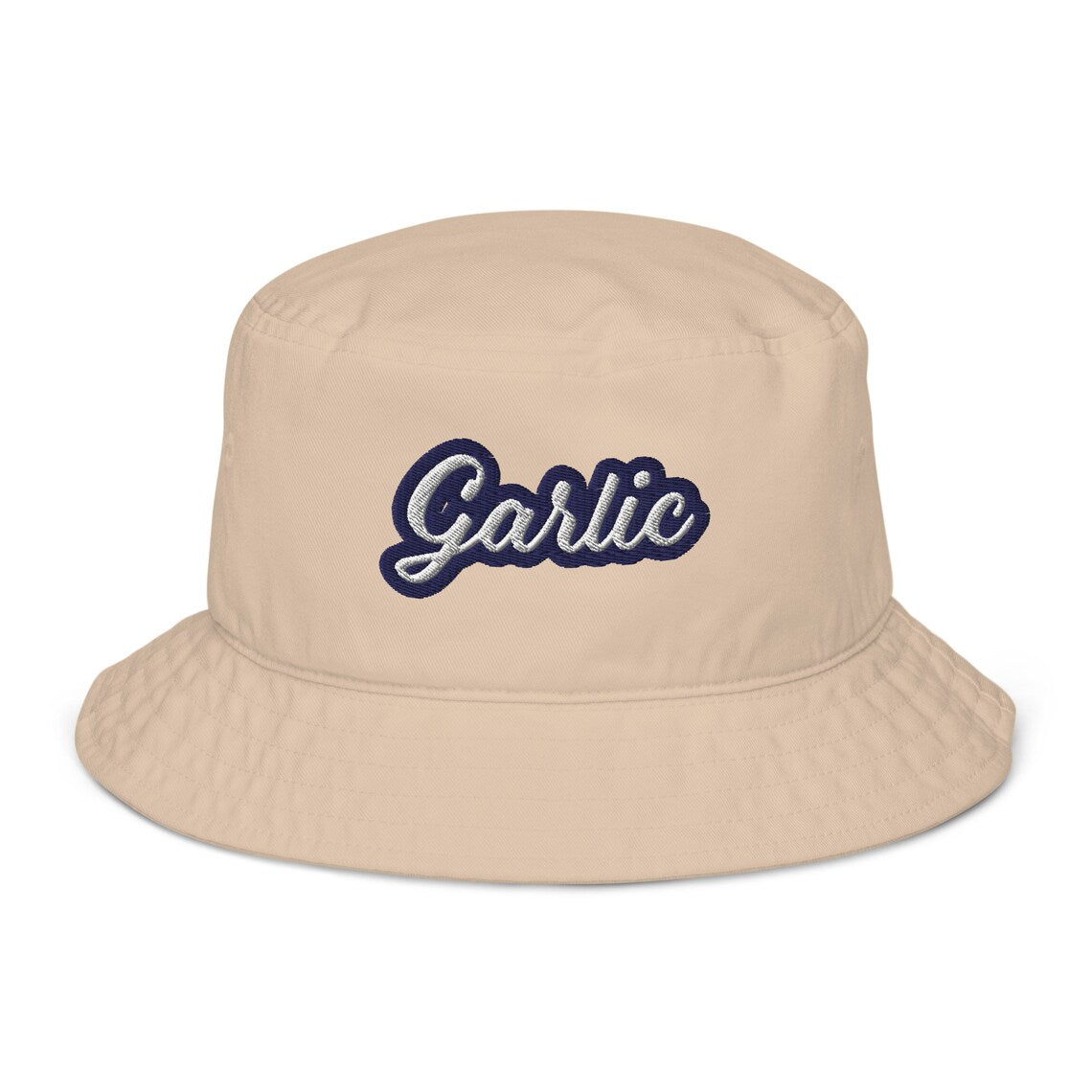 Tan bucket hat with funny foodie embroidery - The funny foodie bucket hat! Made from organic cotton and featuring unique embroidery, this trendy foodie bucket hat is a must-have for garlic enthusiasts. Celebrate your individuality while making a bold statement about your passion for garlic. Eat garlic in style and turn heads with this perfect hat for all garlic lovers!