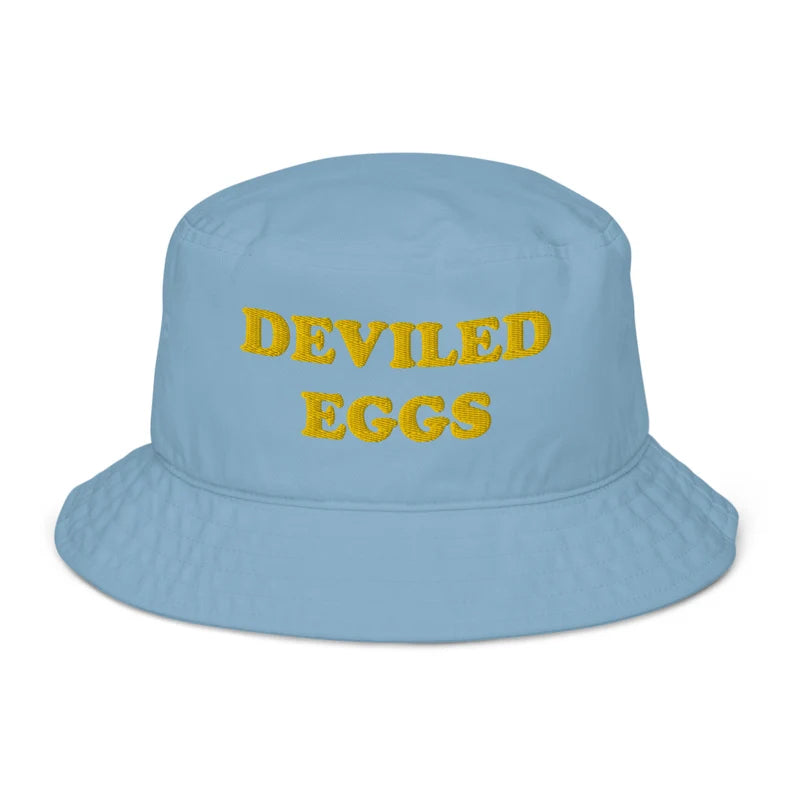 Blue and yellow embroidered bucket hat for beach, summer parties and everything else - This deviled eggs bucket hat is made of organic cotton and comes in a variety of trendy colors with yellow embroidery. It's a weird statement hat for deviled egg lovers and foodies. Eat deviled eggs in style, add individuality to your basics, or give it as a weird summer gift. It's the perfect funny bucket hat for foodies