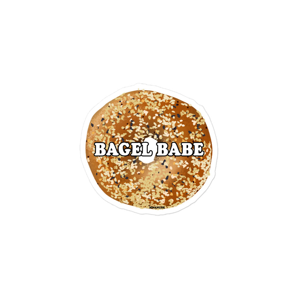 Bagel babe sticker from Nina's Funky Shop by ninanush - The everything bagel babe Vinyl Sticker for bagel enthusiasts. This bagel sticker features a totally unique everything bagel with the words bagel babe. It's an original hand drawn design and it's made just for you. This funky bagel sticker is perfect for your weird sticker collection or a funny gift for a bagel lover.