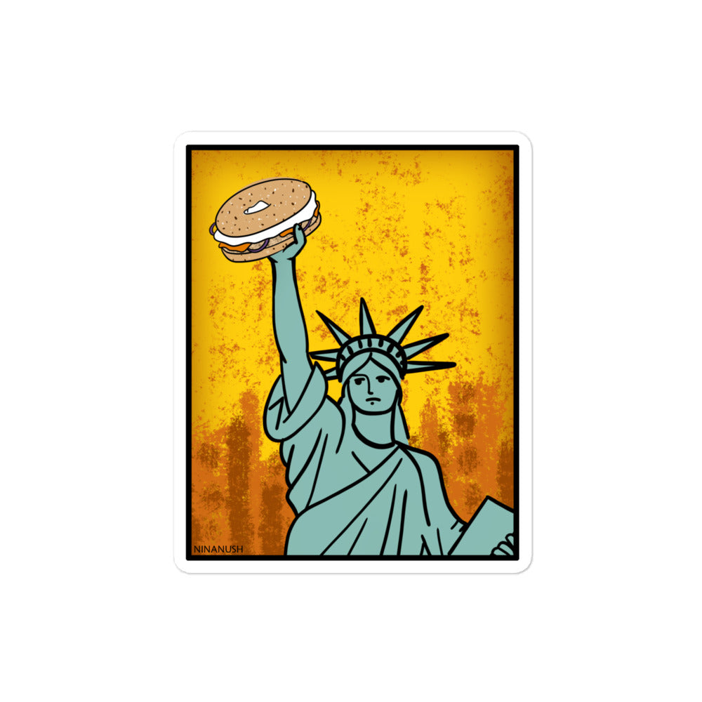 4x4 Statue of Liberty holding a bagel sticker from Nina's Funky Shop by ninanush - The New York Bagel Vinyl Sticker! Designed for bagel enthusiasts, this unique sticker has the Statue of Liberty holding a classic New York bagel. It's an original hand drawn design by Nina and it's made just for you. This funky bagel sticker is the perfect addition to your sticker collection or gift for a bagel lover.