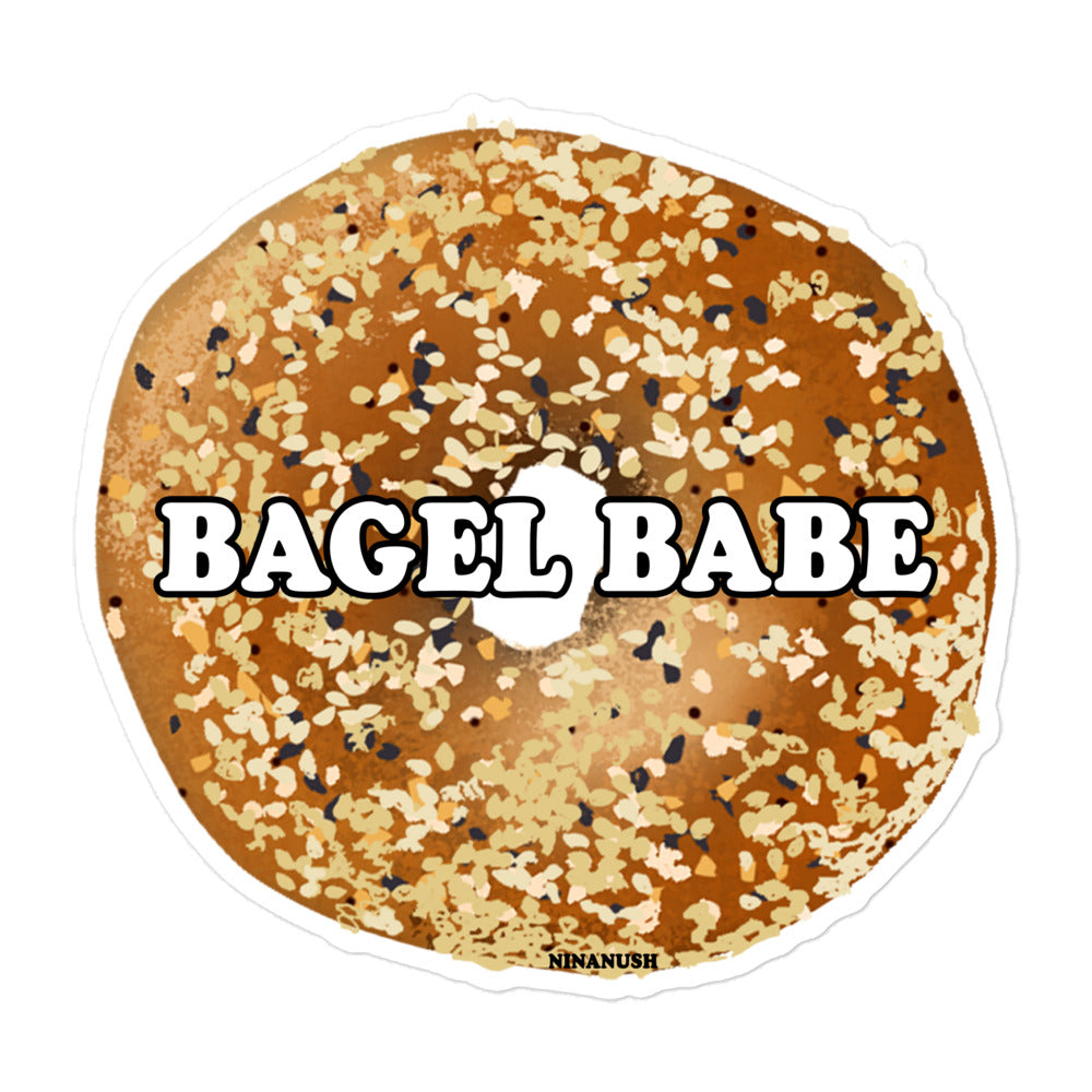 Bagel babe sticker from Nina's Funky Shop by ninanush - The everything bagel babe Vinyl Sticker for bagel enthusiasts. This bagel sticker features a totally unique everything bagel with the words bagel babe. It's an original hand drawn design and it's made just for you. This funky bagel sticker is perfect for your weird sticker collection or a funny gift for a bagel lover.