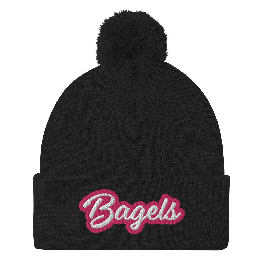 Pink and white bagel beanie in black - Calling all bagel babes! Stay warm and make a statement in our pink and white embroidered beanie for bagel lovers. This funny foodie hat stands out and comes in a variety of colors. It's a unique bagel beanie that's comfortable and made just for you. Eat bagels in style or give it as a funny gift for bagel enthusiasts. 