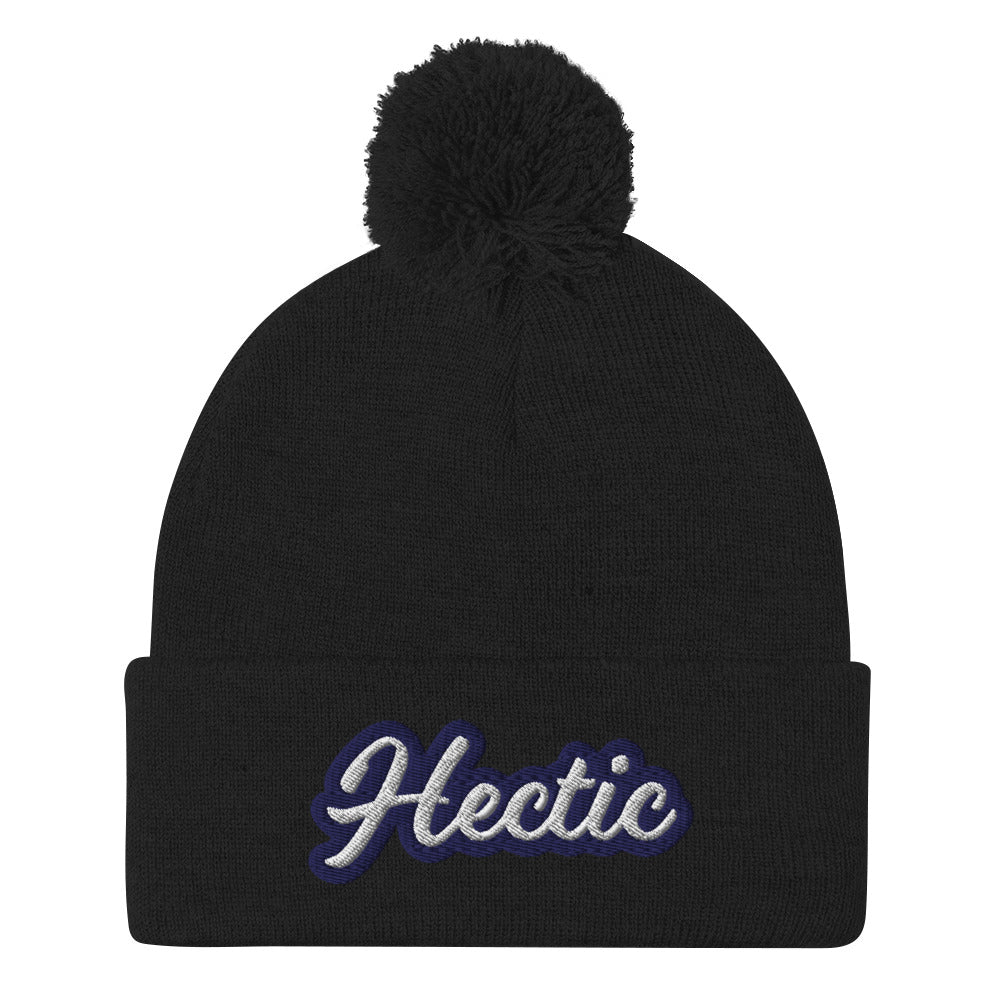 Black Hectic Beanie from Nina's Funky Shop by ninanush - Hectic ⚡ This unique Hectic Hat is warm, cozy, designed by Nina and made just for you. It's a comfortable unisex hectic beanie with a pom pom on top, expertly embroidered with the word "hectic". The perfect funny accessory for everyday streetwear or gift for that hectic friend.