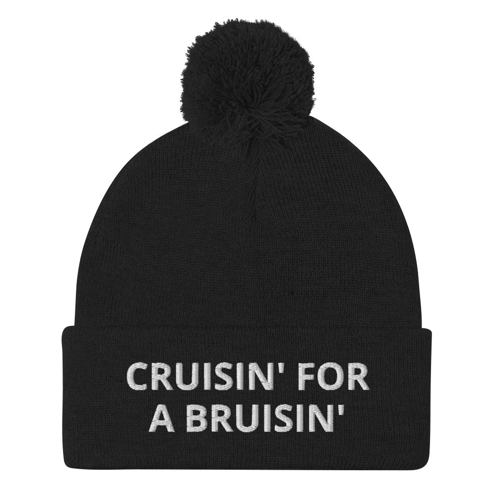 Black Cruisin' for a Bruisin' Hat from Nina's Funky Shop by ninanush - This Cruisin' For A Buisin' Hat is warm, cozy, designed by Nina and made just for you. It's a comfortable unisex garlic beanie with a pom pom on top, expertly embroidered with the words "Cruisin For A Bruisin'". Stand out and stay warm in the perfect weird and funny beanie for all your cold weather looks.