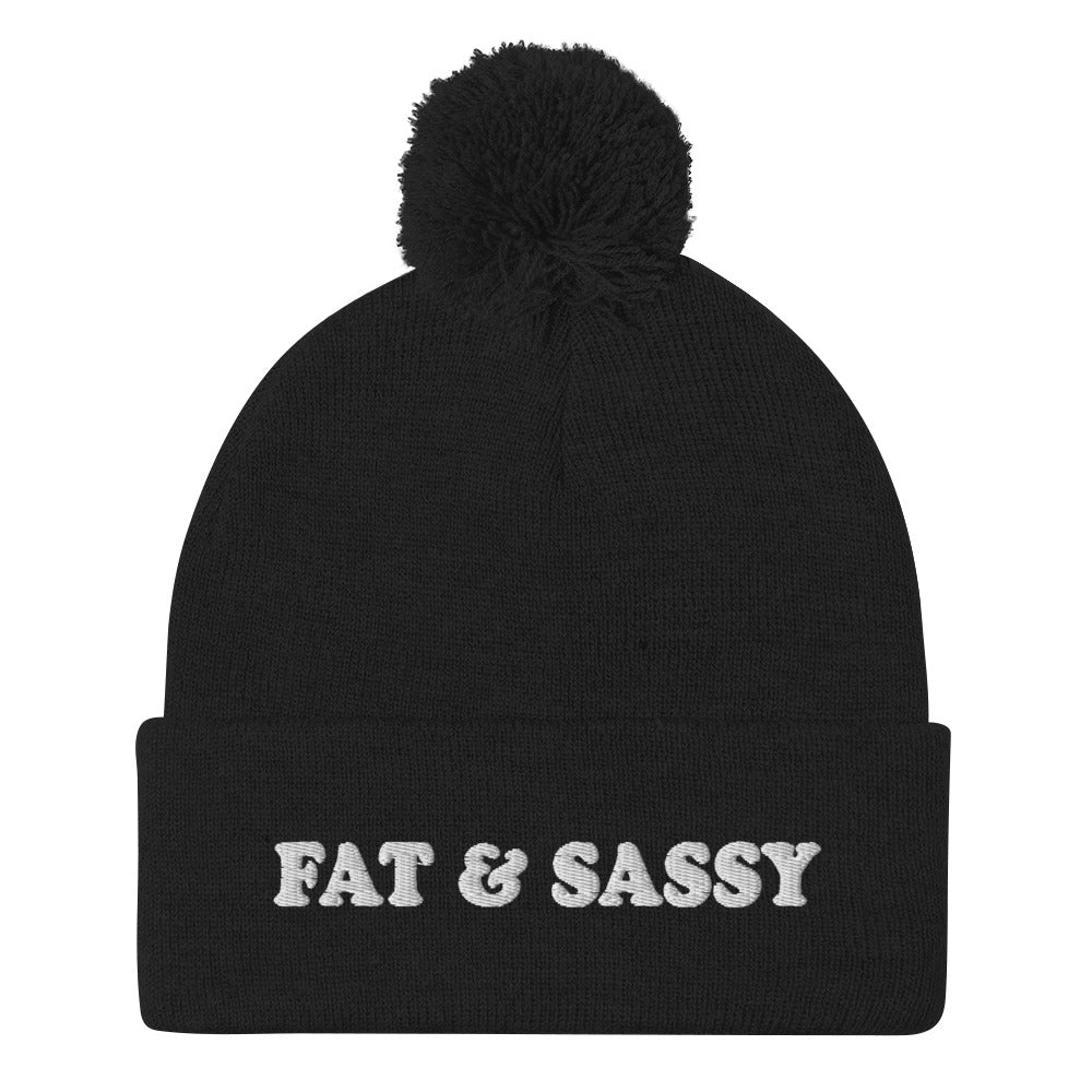 Black Fat and Sassy Beanie from Nina's Funky Shop by ninanush - Feeling fat and sassy? Looking for a fun gift for friend? This unisex, warm and cozy, embroidered pom pom beanie is just what you need. It's a unique and funny beanie with "Fat & Sassy" expertly embroidered on the front. A perfect hat for foodies of all kinds. Celebrate your favorite foods and passions in our funky apparel by Nina.