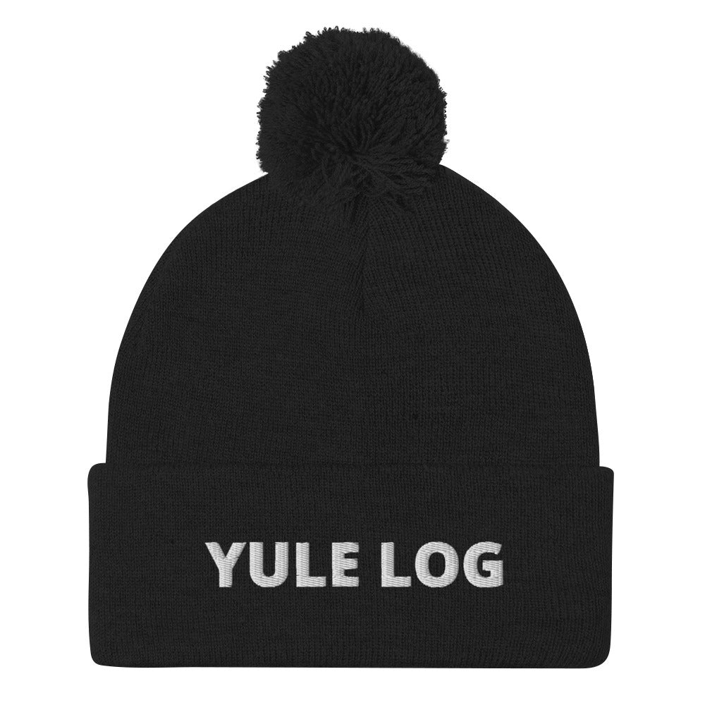 Black Yule Log Beanie from Nina's Funky Shop by ninanush - Do you love yule logs? Looking for a funny holiday hat? This warm and cozy, embroidered pom pom beanie is just what you need. Celebrate your favorite foods in style with this funny foodie Beanie with "Yule Log", expertly embroidered on the front. The perfect funny holiday gift or Christmas beanie for yule log lovers.