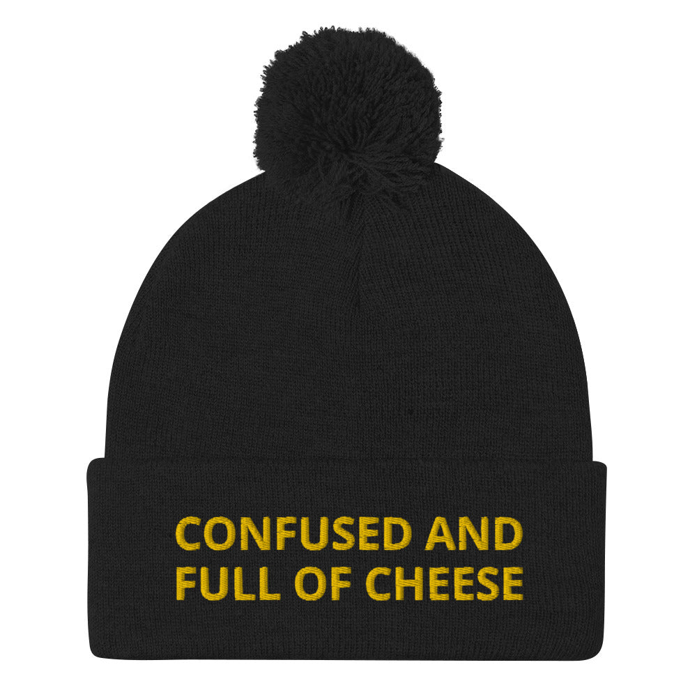 Black beanie with confused and full of cheese embroidered on the front - Do you love cheese? Looking for a funny gift for a foodie? This warm and cozy, embroidered beanie is just what you need. It's a classic pom pom beanie with "Confused and full of cheese", expertly embroidered on the front. The perfect funny beanie for cheese lovers and foodies of all kinds.