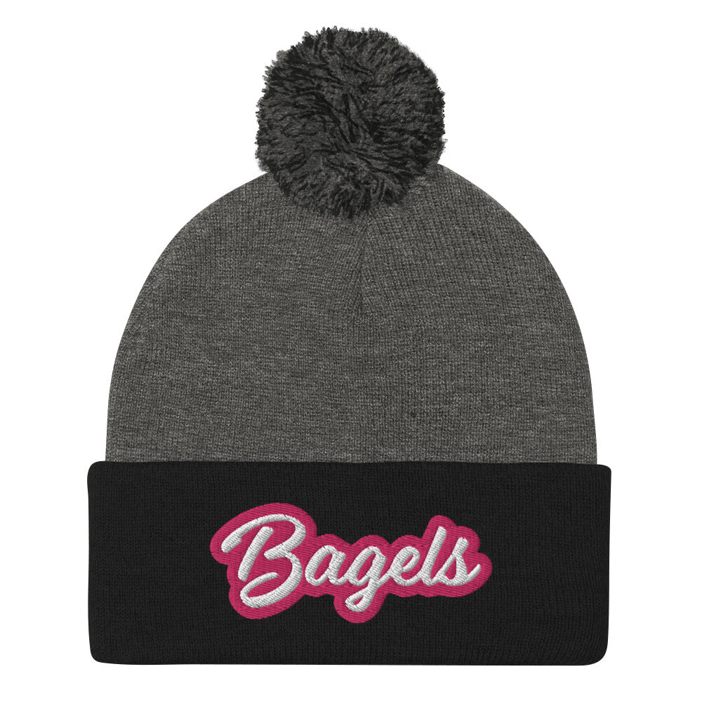 Black and gray bagel beanie with pink and white embroidery - Calling all bagel babes! Stay warm and make a statement in our pink and white embroidered beanie for bagel lovers. This funny foodie hat stands out and comes in a variety of colors. It's a unique bagel beanie that's comfortable and made just for you. Eat bagels in style or give it as a funny gift for bagel enthusiasts. 